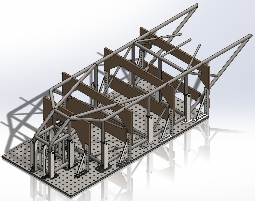 Custom fixtures out of modular laser-cut steel, CNC routed MDF, and 3D printed parts